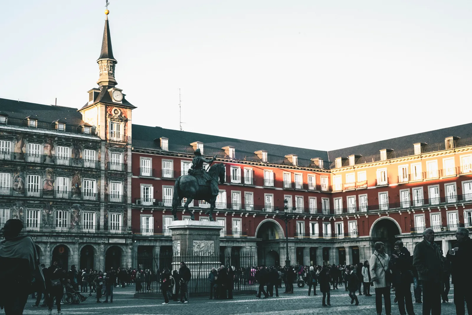 The arcaded facades and equestrian statue of Plaza Mayor in Madrid, Spain