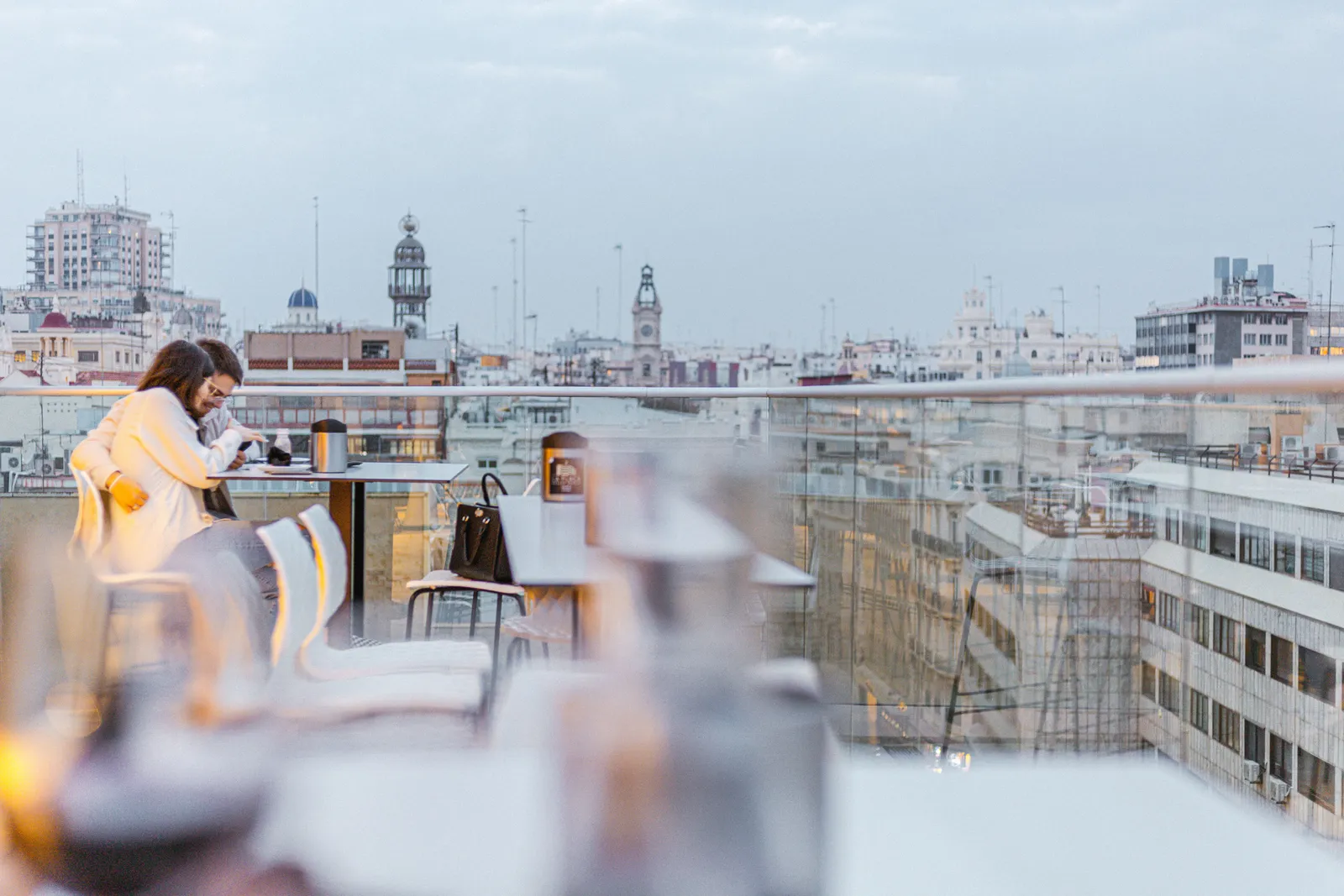 The city skyline seen from a rooftop terrace bar in Madrid, Spain