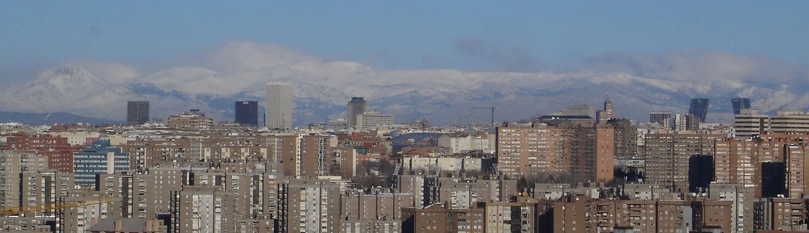 The Madrid skyline with the Guadarrama mountains behind it, Spain