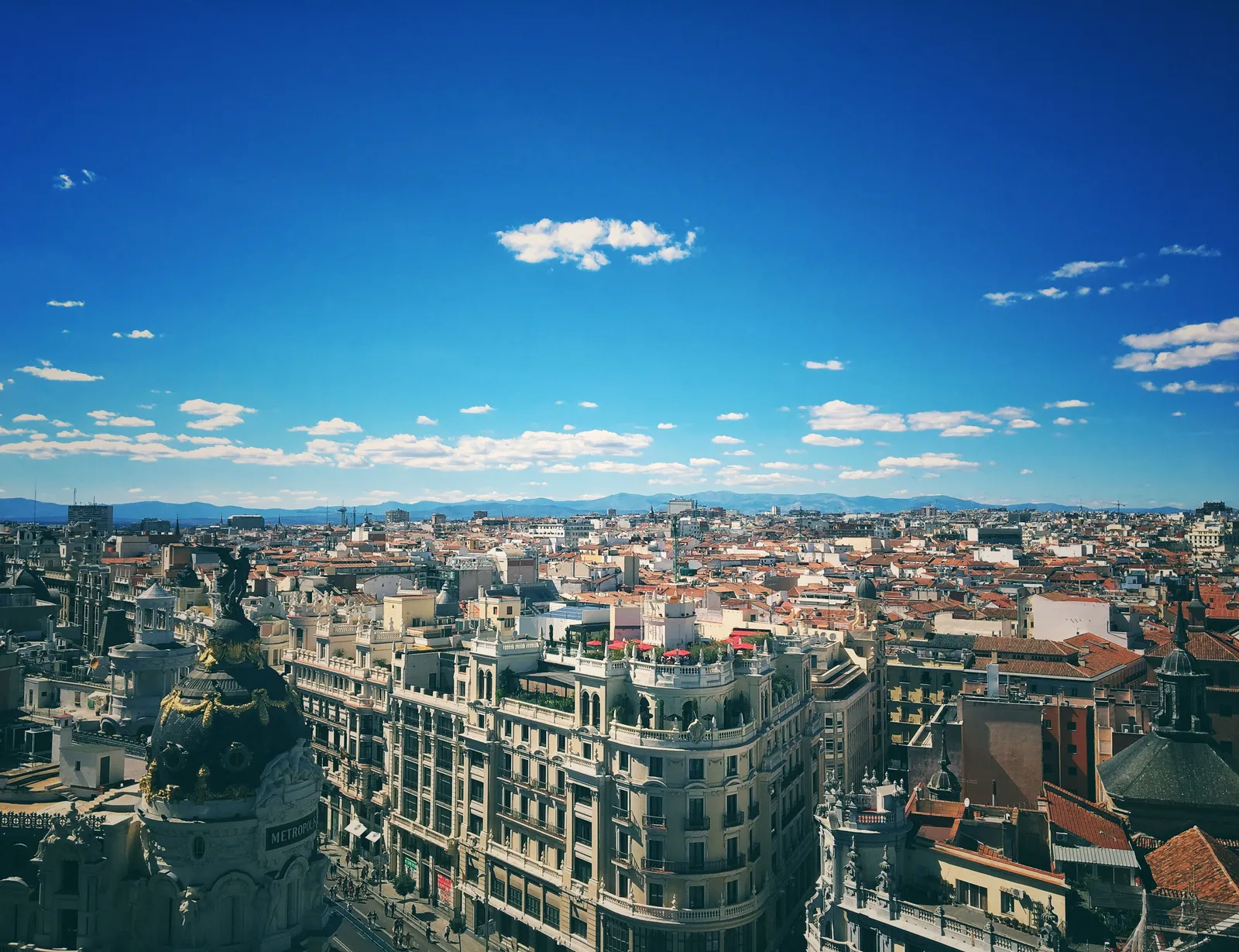 Madrid rooftops and the sierra beyond, seen from a high terrace, Spain