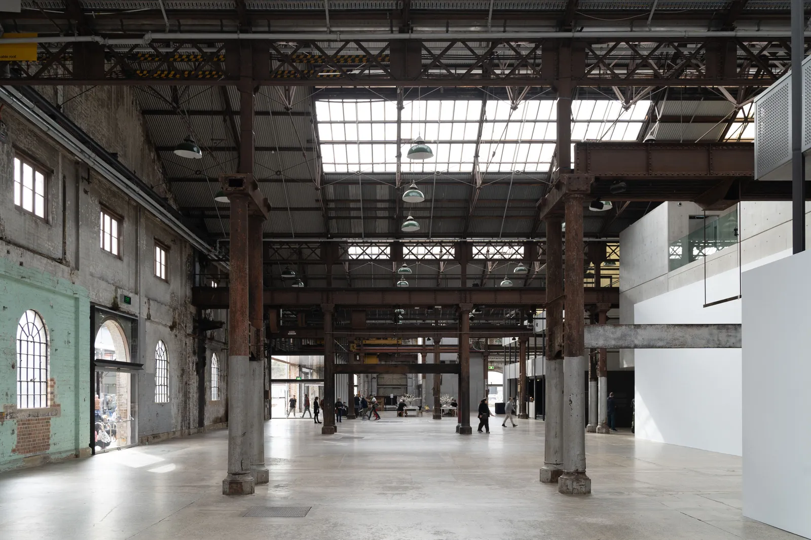 The empty brick and steel interior of a converted industrial hall at Matadero Madrid, Spain