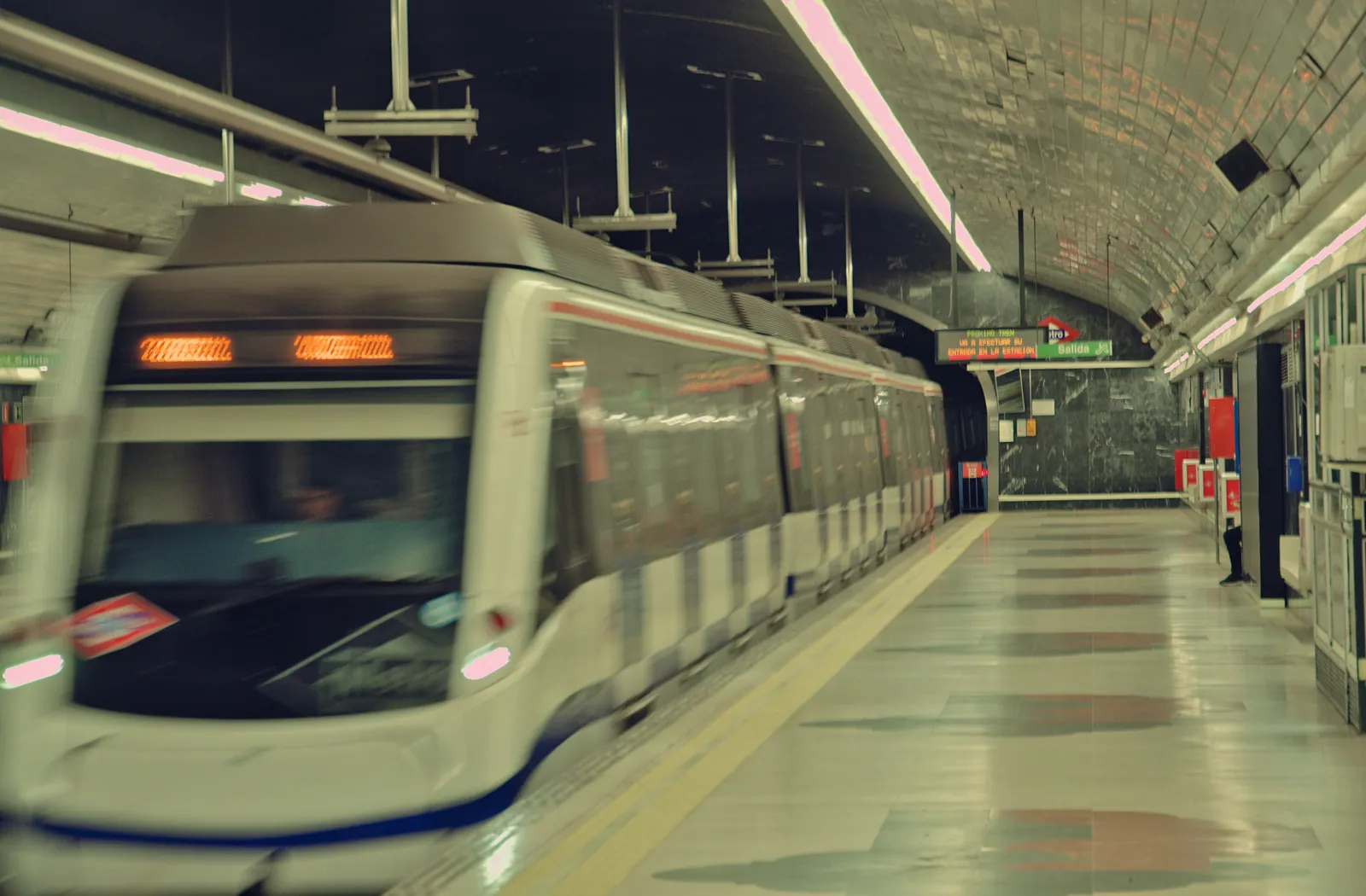 A Metro de Madrid train at the Estadio Metropolitano station platform serving the Atletico Madrid stadium, Spain