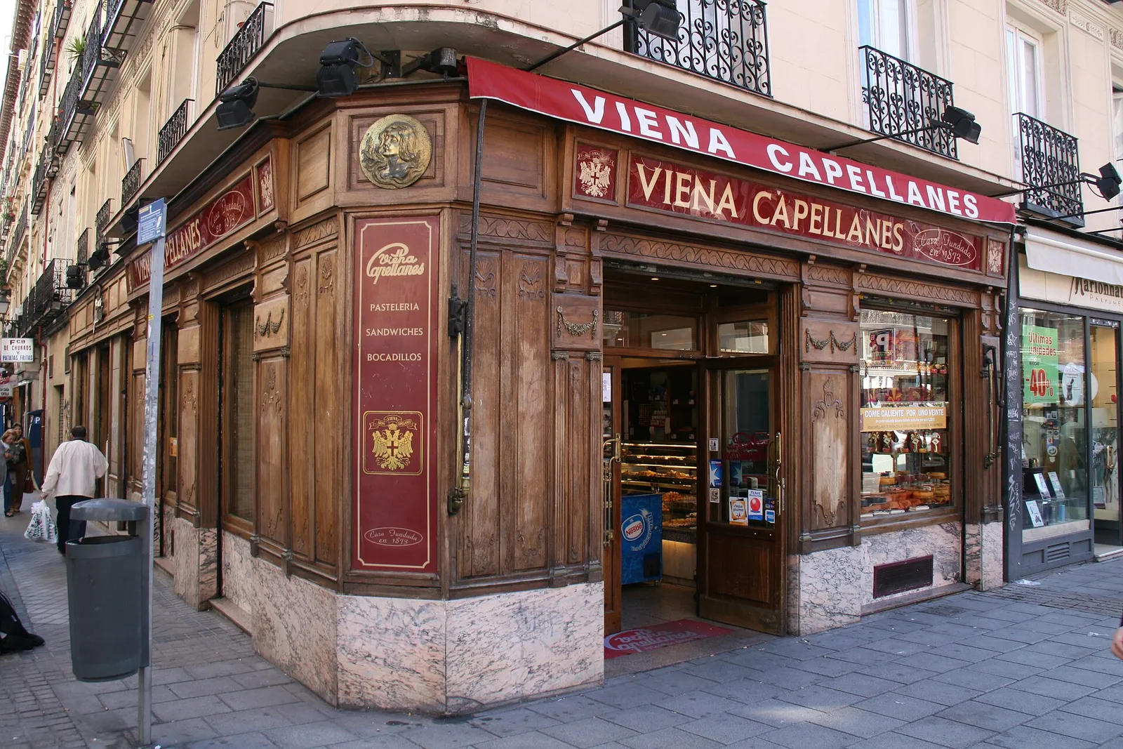 The front of a traditional bakery and food shop on Calle Fuencarral, Madrid, Spain